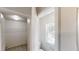 View of the toilet and walk-in closet with wire shelving at 881 Upland Ives Dr, Sugar Hill, GA 30518