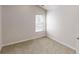 Bedroom with natural light, neutral paint, and carpet at 881 Upland Ives Dr, Sugar Hill, GA 30518