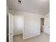 Carpeted bedroom and closet, with neutral paint, offering storage solutions in the new home at 881 Upland Ives Dr, Sugar Hill, GA 30518