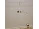 Clean, utility room with the dryer hookup at 881 Upland Ives Dr, Sugar Hill, GA 30518