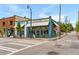 Charming exterior of Little Tart Bakeshop featuring awnings, outdoor seating, and a sidewalk in front at 1062 Grant Ter Se, Atlanta, GA 30315