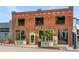 Halfway Crooks City Brewery exterior, showcasing brick architecture, large windows, and street-side seating at 1062 Grant Ter Se, Atlanta, GA 30315