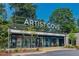 Exterior view of Artist Cove, a commercial building with large windows and a prominent sign at 1062 Grant Ter Se, Atlanta, GA 30315