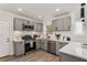 Modern kitchen featuring stainless steel appliances, gray cabinets, and white countertops for a sleek design at 1062 Grant Ter Se, Atlanta, GA 30315