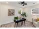 Bright office featuring a ceiling fan, gray rug, modern art, and a black desk at 1062 Grant Ter Se, Atlanta, GA 30315