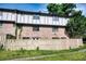 Back of townhome with a wooden fence and lush green lawn at 1151 Rankin St # 2C, Stone Mountain, GA 30083