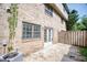 An inviting brick patio with double doors and a privacy fence offers a secluded outdoor living space at 1151 Rankin St # 2C, Stone Mountain, GA 30083