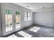 Unfinished basement with french doors and natural light at 1151 Rankin St # 2C, Stone Mountain, GA 30083