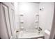 A cozy bathroom with a tub and shower combination provides convenience at 1151 Rankin St # 2C, Stone Mountain, GA 30083