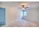 A bright bedroom with a ceiling fan and a window offers ample natural light at 1151 Rankin St # 2C, Stone Mountain, GA 30083