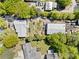 Bird's eye view highlights the home, outbuildings, and ample parking at 2909 Jones Mill Rd, Atlanta, GA 30360
