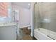 ' bathroom with double sinks, granite countertops, a bathtub, and a shower at 2909 Jones Mill Rd, Atlanta, GA 30360