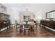 Elegant dining room featuring hardwood floors, antique furniture, and plenty of space for entertaining at 2909 Jones Mill Rd, Atlanta, GA 30360