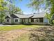 Charming single-story home with a well-manicured front lawn at 2909 Jones Mill Rd, Atlanta, GA 30360