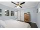 Charming bedroom with hardwood floors and double-door closet, plus stylish decorations at 3099 Dove Way, Decatur, GA 30033