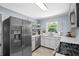 Modern kitchen with stainless steel appliances, bright white countertops and ample natural light at 3099 Dove Way, Decatur, GA 30033