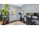 Functional home office space with natural light, ample storage, and a dedicated workout area at 3099 Dove Way, Decatur, GA 30033