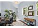 Home office with natural light, wood floors, and shelving for books, perfect for work or study at 3099 Dove Way, Decatur, GA 30033