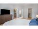 Spacious bedroom featuring neutral walls, walk in closet, and ensuite bathroom at 4337 Orchard Park Ct, Stone Mountain, GA 30083