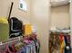 Neat closet with shelves and hanging clothes at 4337 Orchard Park Ct, Stone Mountain, GA 30083