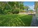 A lush lawn bordered by a wooden fence offers a private backyard oasis at 501 Dargan Sw Pl, Atlanta, GA 30310