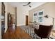 Inviting bedroom featuring hardwood floors, ample natural light and neutral decor at 501 Dargan Sw Pl, Atlanta, GA 30310