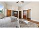Spacious bedroom with fireplace, hardwood floors, and access to the ensuite bath at 501 Dargan Sw Pl, Atlanta, GA 30310