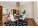 Elegant dining room boasts stained glass windows and hardwood floors at 501 Dargan Sw Pl, Atlanta, GA 30310
