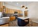 Modern kitchen featuring stainless steel appliances and island with bar seating at 501 Dargan Sw Pl, Atlanta, GA 30310