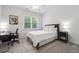 Comfortable bedroom with a ceiling fan, natural light, desk and chair at 7045 W Mountain Xing, Cumming, GA 30041