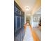 Inviting entryway boasting hardwood floors and a view into the home's living spaces at 905 Downyshire Dr, Lawrenceville, GA 30044