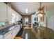 Spacious kitchen features granite countertops, modern appliances, and ample cabinet space at 905 Downyshire Dr, Lawrenceville, GA 30044
