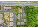 Aerial view of the property showcasing mature trees, landscaping, parking, and surrounding community at 168 Constitution Blvd # 12, Lawrenceville, GA 30046