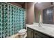 A bathroom features toilet, vanity with sink, mirror, and bath/shower combination at 168 Constitution Blvd # 12, Lawrenceville, GA 30046