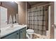 Bathroom with sink, toilet, and shower/bath with stylish patterned shower curtain at 168 Constitution Blvd # 12, Lawrenceville, GA 30046