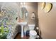 Charming powder room with stylish wallpaper and pedestal sink at 168 Constitution Blvd # 12, Lawrenceville, GA 30046
