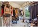 Walk-in closet with shelving and organization system for clothing at 168 Constitution Blvd # 12, Lawrenceville, GA 30046