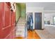 Welcoming foyer with hardwood floors and staircase at 168 Constitution Blvd # 12, Lawrenceville, GA 30046