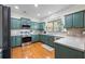 Well-equipped kitchen with ample cabinet space, stainless steel appliances, and hardwood floors at 168 Constitution Blvd # 12, Lawrenceville, GA 30046