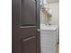 Laundry room showcasing a washer and dryer with shelving for storage at 168 Constitution Blvd # 12, Lawrenceville, GA 30046