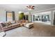 Expansive living room with carpet and an easy flow to the dining area at 168 Constitution Blvd # 12, Lawrenceville, GA 30046