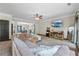 Open concept living room with neutral decor and plenty of natural light at 168 Constitution Blvd # 12, Lawrenceville, GA 30046
