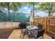 Outdoor patio featuring a table with chairs and a grill, perfect for entertaining at 168 Constitution Blvd # 12, Lawrenceville, GA 30046
