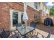 Outdoor patio featuring a table with chairs, perfect for entertaining and outdoor dining at 168 Constitution Blvd # 12, Lawrenceville, GA 30046