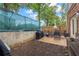 Outdoor patio featuring a table with chairs, and a grill; perfect for entertaining at 168 Constitution Blvd # 12, Lawrenceville, GA 30046