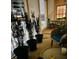 Inviting balcony with seating, plants, and views of the city at night at 211 Colonial Homes Nw Dr # 2508, Atlanta, GA 30309