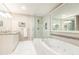 Modern bathroom featuring a glass shower and luxurious soaking tub at 211 Colonial Homes Nw Dr # 2508, Atlanta, GA 30309