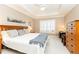 Large bedroom with tray ceilings, big windows and a ceiling fan provides great natural light at 211 Colonial Homes Nw Dr # 2508, Atlanta, GA 30309