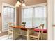 Bright breakfast nook with built-in bench seating and views to the exterior at 211 Colonial Homes Nw Dr # 2508, Atlanta, GA 30309