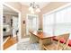 Cozy breakfast nook bathed in natural light, features a view of a nicely furnished living room at 211 Colonial Homes Nw Dr # 2508, Atlanta, GA 30309